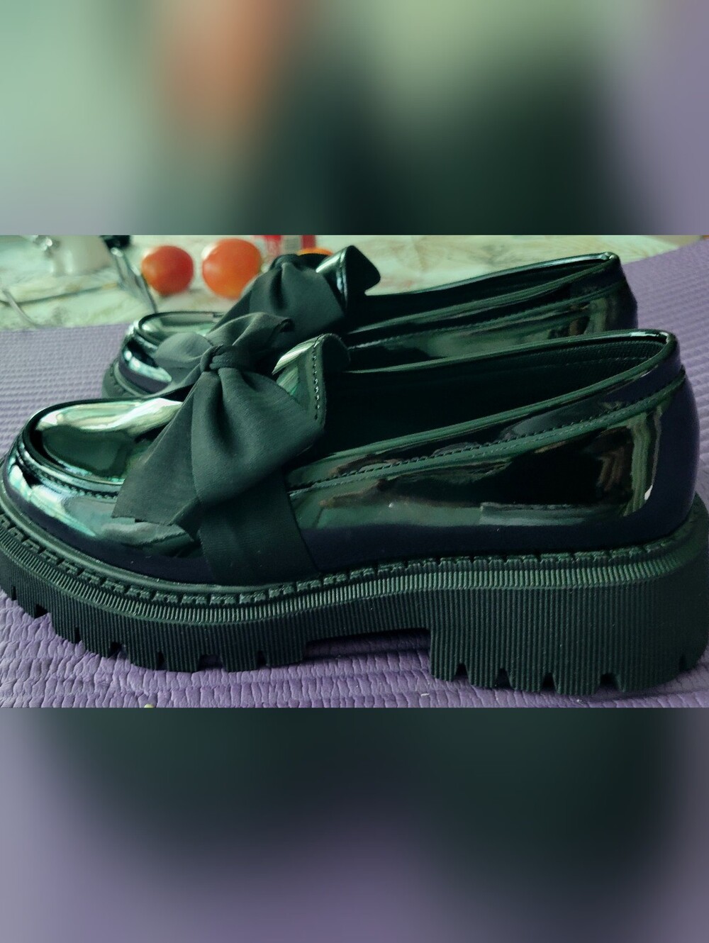 Black Patent Lug Sole Loafers with Bow.⁹